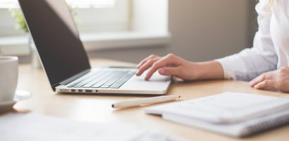 Business Woman Working on Laptop